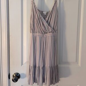 a very flattering american eagle striped romper. size small